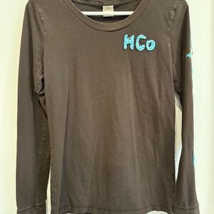 Hollister Woman’s Brown Long Sleeve Tee with Blue 3D Logo